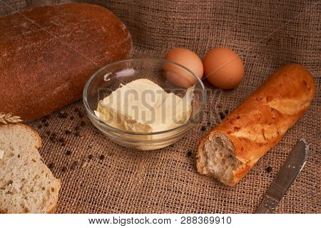 Top View Of Sliced Wholegrain Bread On Dark Ructic Wooden Background Closeup
