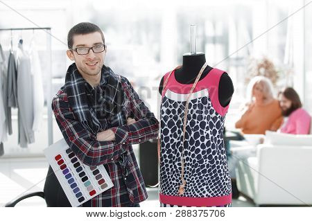 Creative Fashion Designer Standing In His Studio