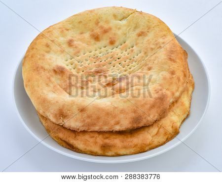 Taftan. A Traditional Pakistani Fluffy And Oily Bread Baked In Clay Oven.