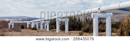 Close-up Metal Pipes In The Field. Pipes From The Pipeline. Gas Pipeline For Gas Pumping. Heat-pipe.
