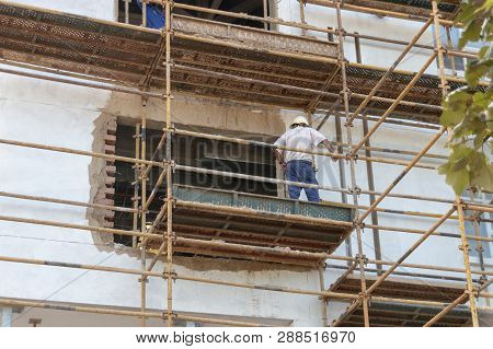 A Close Up View Of A Construction Site Where A New Building Is Being Constructed And They Have Put U