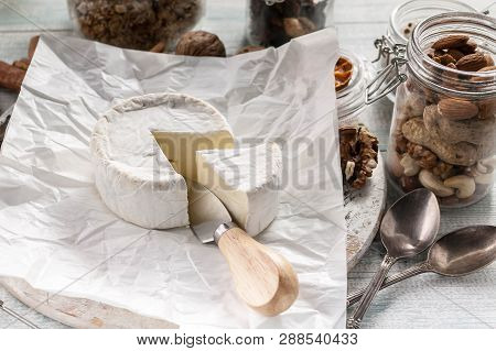Appetizing French Camamber Cheese On Wooden Background