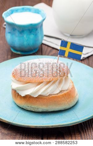 Traditional Swedish Dessert Semla, Also Called Shrove Bun, With Almond Paste And Whipped Cream Filli