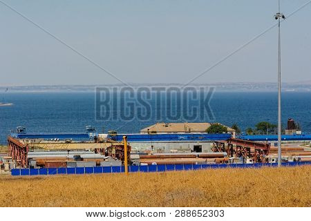 Taman, Russia - July 12, 2017: Construction Of A Bridge Across The Kerch Strait, A View Of The Coast