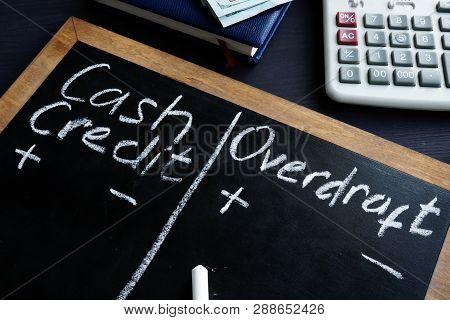 Cash Credit Vs Overdraft Handwritten On A Blackboard.