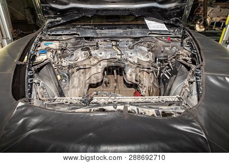 Car Repair In The Back Of The Suv With A View Of The Engine Compartment With The Engine Removed And 
