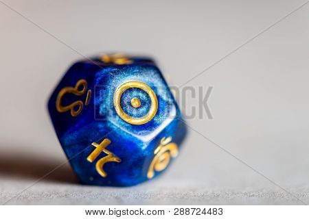 Astrology Dice With Symbol Of The Sun On Grey Background