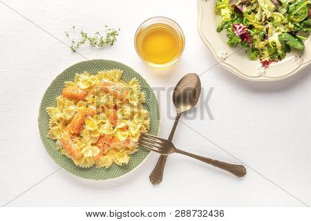 Pasta And Wine, Italian Dinner. Farfalle With Smoked Salmon And Cream Sauce, Shot From The Top With 