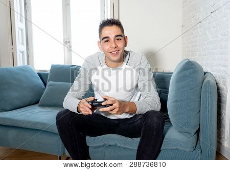 Close Up Portrait Of Young Man Playing Video Game Having Fun, In Video Game Addiction Or Leisure