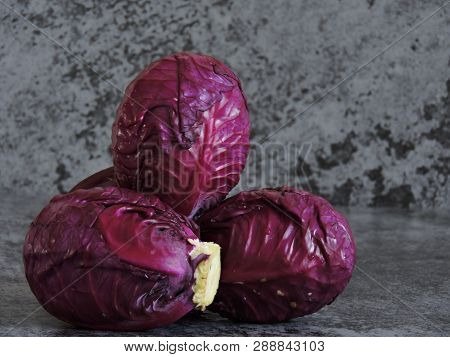 Blue Cabbage With Water Drops. Background Of Blue Cabbage. Blue Cabbage Heap.