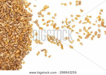 Lot Of Whole Raw Bulgur Grains Copyspace On Left Flatlay Isolated On White Background