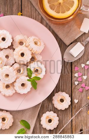 Teatime With Canestrelli Italian Butter Biscuits On Wooden Table.