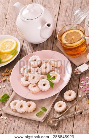 Teatime With Canestrelli Italian Butter Biscuits On Wooden Table.