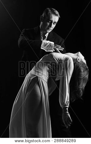 Falling In Love. Mime Man And Woman Act In Romantic Scene. Couple In Love With Mime Makeup. Theatre 