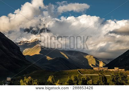 Mountain Shkhara Sunset Landscape With Beautiful Clouds And Dramatic Light.