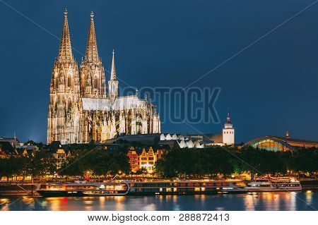 Night View Of Cologne Cathedral, Germany. Europe. World Heritage - A Roman Catholic Gothic Cathedral
