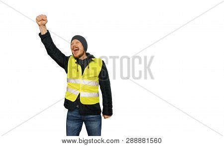Protests Yellow Vests. Man Raised His Hand Into A Fist And Shouted On Isolated