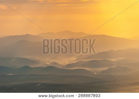 Beautiful Mountain And Morning Sunrise Over The Sea Of Mist. Mon Sone View Point , Doi Pha Hom Pok N