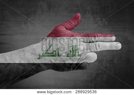 Iraq Flag Painted On Male Hand Like A Gun