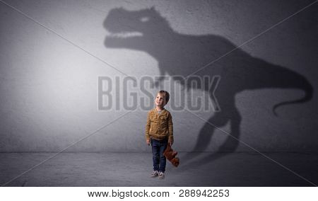 I m dreaming about dinosaurus concept with cute little boy in an empty room
