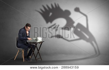 Man working hard and he is afraid of a yelling shadow