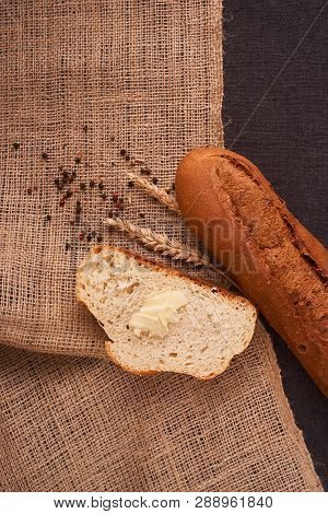 Top View Of Sliced Wholegrain Bread On Dark Ructic Wooden Background Closeup