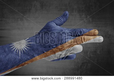 Marshall Islands Flag Painted On Male Hand Like A Gun