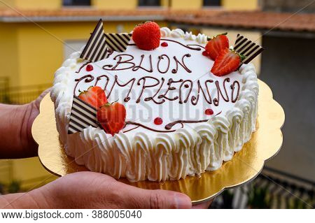 Traditional White Italian Birthday Cake With Congratilations, Buon Compleanno Means Happy Birthday C