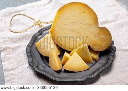 Italian Semi Hard Matured Caciocavallo Cheese, Handmade And Aged In Natural Underground Caves In Apu