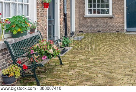 Colorful Autumn Season In The Old Beguinage In The Dutch City Of Breda. The Beguinage Was Founded In