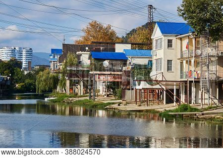 Sochy, Russia - September 14, 2020: The Bank Of The Dagomys River Is Entirely Built Up With Small Co