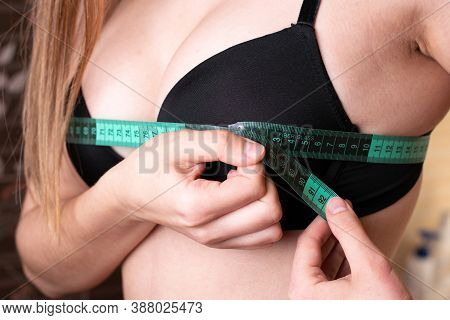 Young Women Measured Her Chest With A Measuring Tape