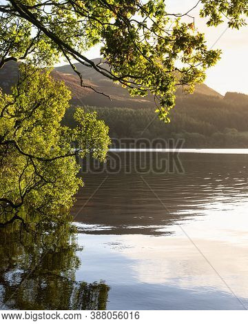 Beautiful Sunrise Landscape Image Looking Across Loweswater In The Lake District Towards Low Fell An