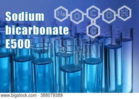 Text Sodium Bicarbonate E500 With Soda Formula And Test Tubes On Background