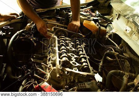 Repair Car Engine, Open Up Engine In Automotive Service Center Or Garage