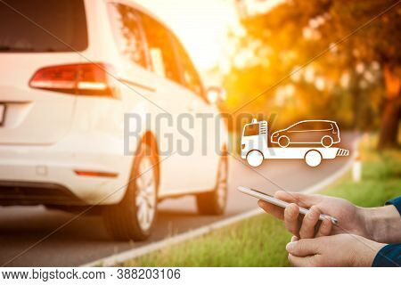 Search Assistance Service (wrecking Towing Breakdown Service) On Smart Phone. Person With Smart Phon
