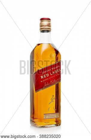 St.Petersburg, Russia - April  2020 - Bottle of Johnnie Walker Red Lebel blended scotch whisky isolated on white background.