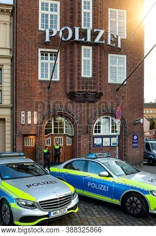 Hamburg, Germany - Sep 14, 2020:German police building and sign on a wall in Hamburg, Reeperbahn. Hamburg Police Department 15