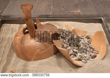 Archeological Museum Of Laspezia, Italy - Summer 2020: Clay And Tile Incinerated Tomb, First Century