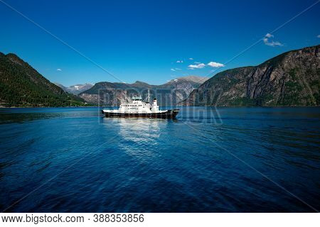 EIDSDAL, NORWAY - AUGUST, 17, 2020: Ferry crossing between Linge and Eidsdal on the scenic Route 63 across the Tafjorden, Norway