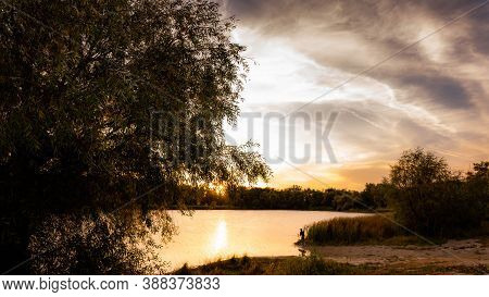 Autumn Sunset On Lake Krugloye. The Natural Park 