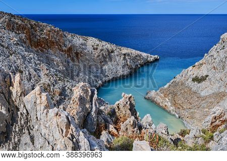 View Of Z-shaped Bay, Greek Landscape. Blue Sky, Beautiful Clouds, Sunny Day. Azure Sea. Seitan Lima