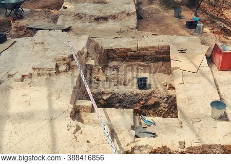 Place Of Archaeological Excavations. Archaeologists Tools To  Background Find Historic Buildings