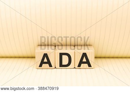Word Ada Americans With Disabilities Acton Wooden Blocks On Paper Background Top View