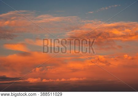 Beautiful Cloudscape With Colorful Contrasting Clouds At Sunset