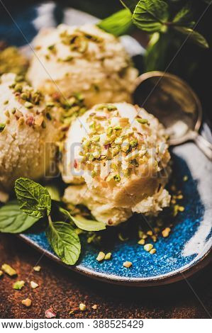Turkish Dessert Semolina Helva With Pistachio And Mint On Plate