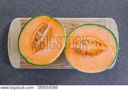 Simple Food Ingredients, Close-up Of Rockmelon On Cutting Board