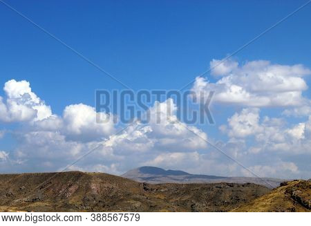 In The Evening White Clouds Hover On The Top Of Vayots Mountain