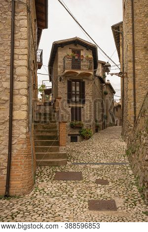 Narow Street With Steps At Medieval City Of Collalto Sabino In Abruzzo In Italy