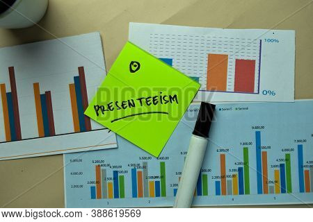 Presenteeism Write On Sticky Notes Isolated On Office Desk.